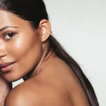 Elegant young woman with beautiful and healthy skin